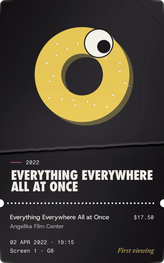 Everything Everywhere All at Once: a gold bagel with a googly eye.